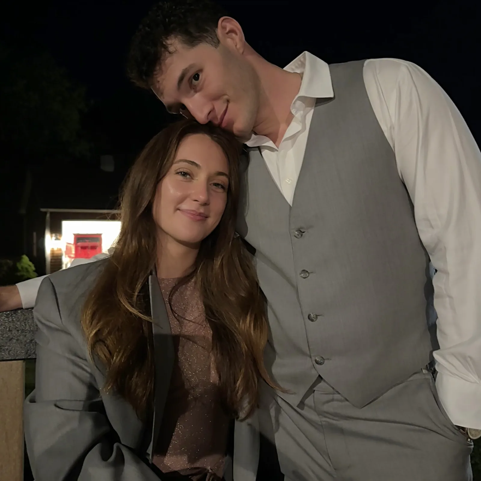 Meaghan and Roman dressed up at night